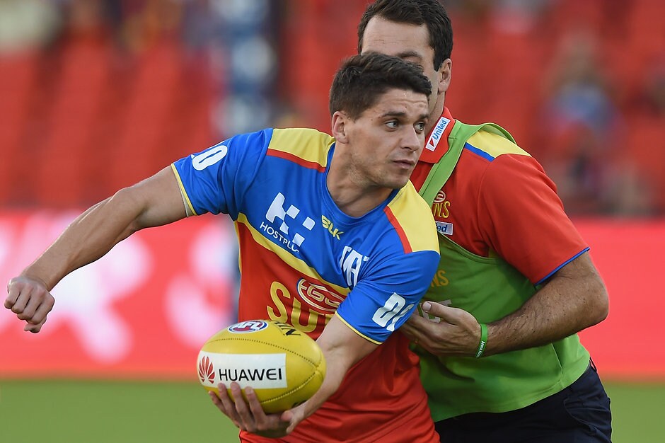 AFL 2016 Rd 07 - Gold Coast v Melbourne GOLD COAST, AUSTRALIA - MAY 7: Dion Prestia of the Suns warms up before the 2016 AFL Round 07 match between the Gold Coast Suns and the Melbourne Demons at Metricon Stadium, Gold Coast on May 7, 2016. (Photo by Matt Roberts/AFL Media)